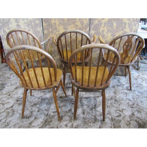 1142 - Five vintage Windsor style stick back chairs including three carvers