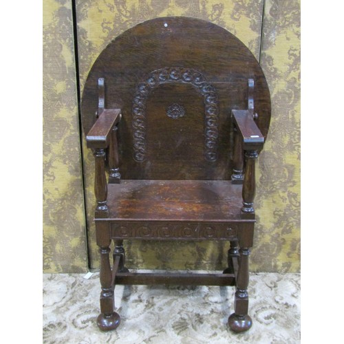 1211 - A reproduction oak monks seat with circular top and carved detail, together with an Old English styl... 