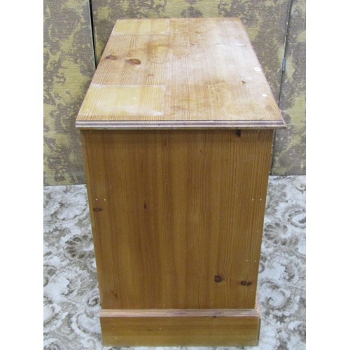 1165 - Small stripped pine bedroom chest of two long and two short drawers, raised on bracket supports, 70c... 