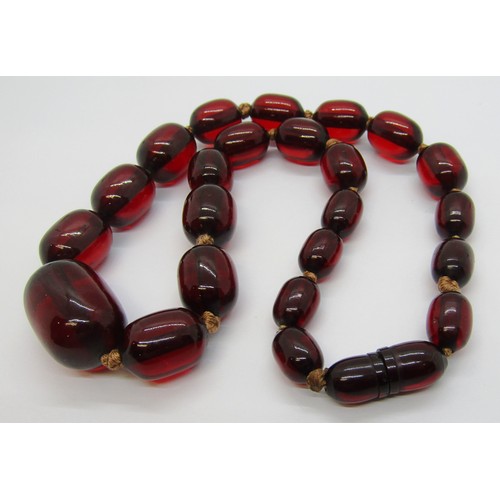 278 - Graduated cherry amber coloured bead necklace, 36.5g