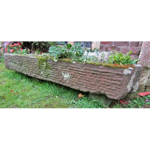 1036 - A large carved natural stone three divisional trough/planter of low rectangular form, 20cm high x 15... 