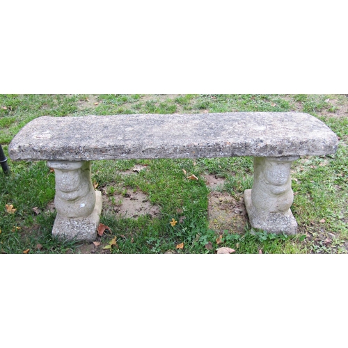 1024 - A novelty weathered cast composition stone three sectional garden bench with squirrel supports, 40cm... 