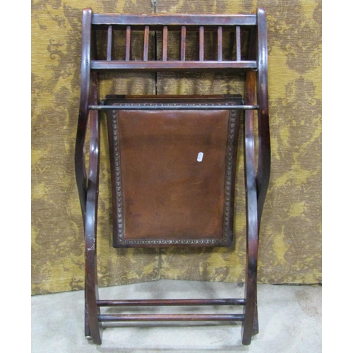 1219 - An Edwardian folding X framed stool with studded leather upholstered seat, 69cm high x 46cm x 42cm