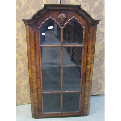 1224 - A George I style walnut hanging corner cabinet enclosed by a glazed panelled door, 118cm high x 71cm... 