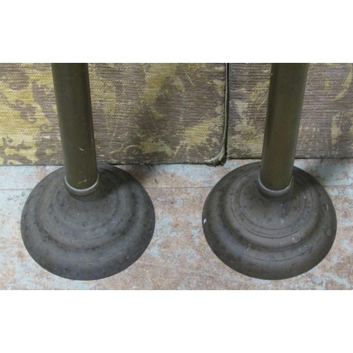 1303 - A pair of ecclesiastical floor standing candlesticks, 124cm high