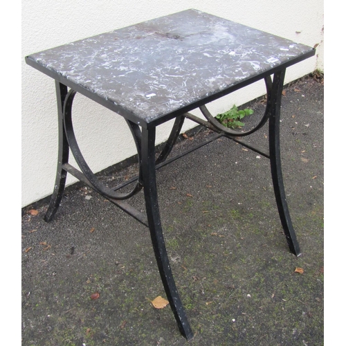 1492 - A marble topped hall table set on an iron frame with swept supports, 69cm x 51cm