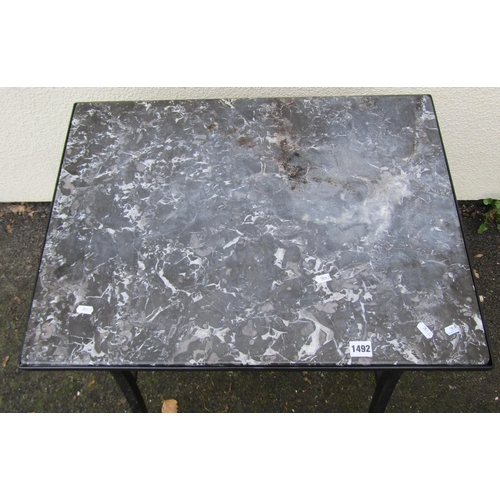 1492 - A marble topped hall table set on an iron frame with swept supports, 69cm x 51cm