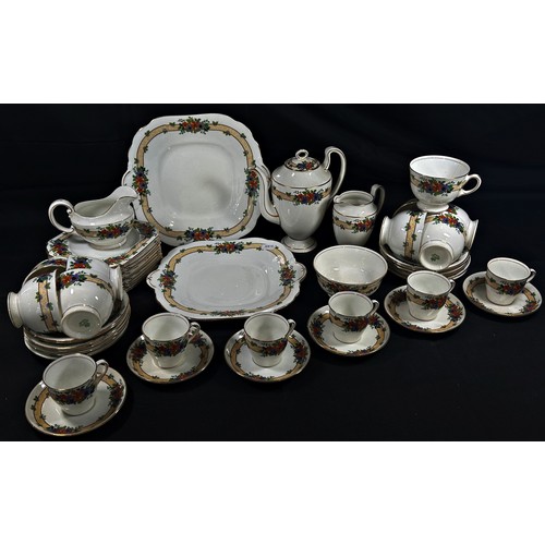 149 - A group of Aynsley tea and coffee wares in cream ground with floral decoration.