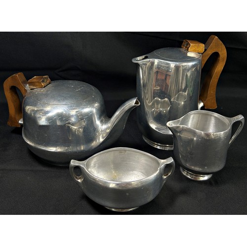 189 - A five piece Piquot ware tea and coffee service with sugar bowl, jug and tray.