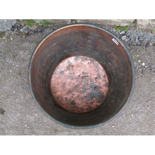 1039 - Small heavy gauge copper cauldron with rolled rim and pop rivetted seams, 29cm high x 42 diameter