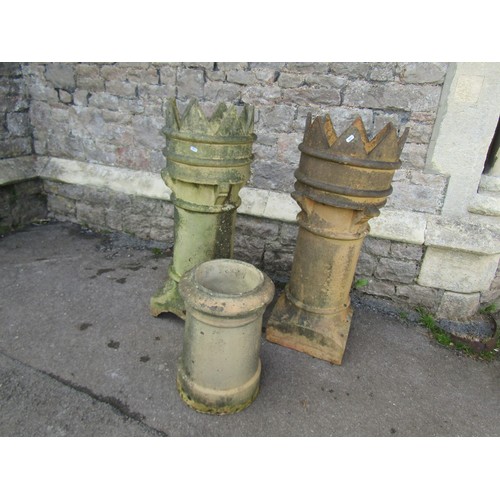 1006 - Pair of weathered buff-coloured crown top cylindrical chimney pots, 94cm high, together with a small... 