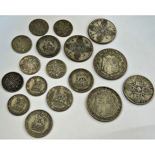 308 - A mixed group, pre 1947 silver coins, half crowns, florins, shillings etc, 21 ozt (gross weight)