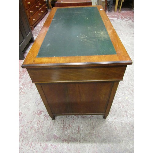 1547 - A small late Victorian walnut pedestal writing desk of nine drawers with inset top, 105cm long x 58c... 