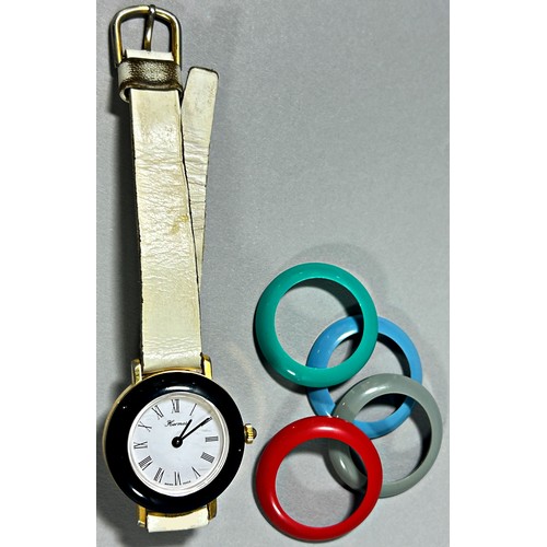 317 - A mixed group, quartz wristwatches, small clocks etc