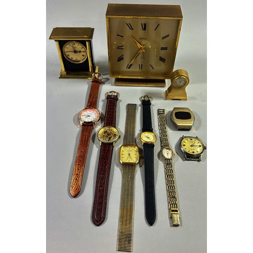 317 - A mixed group, quartz wristwatches, small clocks etc