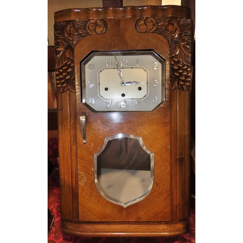 350 - A mixed collection of clocks to include continental walnut wall clocks, others in the Art Deco style... 