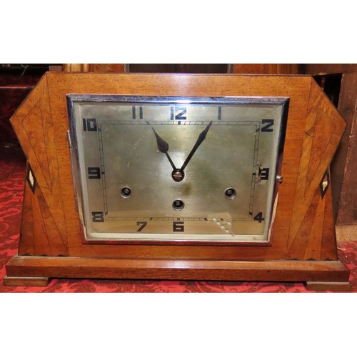 350 - A mixed collection of clocks to include continental walnut wall clocks, others in the Art Deco style... 