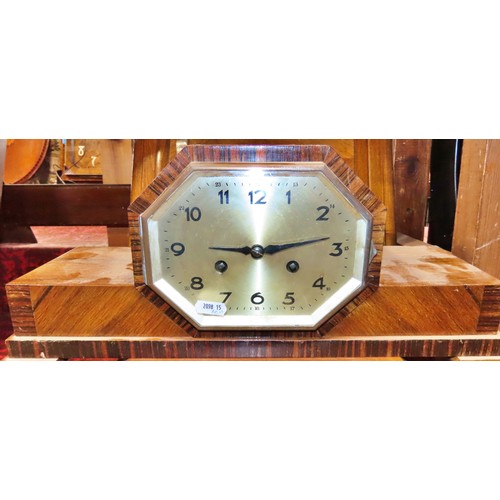 350 - A mixed collection of clocks to include continental walnut wall clocks, others in the Art Deco style... 