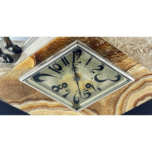 342 - A large early 20th century continental onyx and marble clock garniture in the Art Deco style, the cl... 