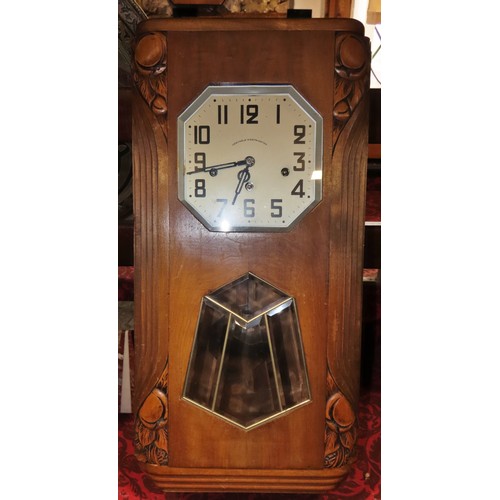 350 - A mixed collection of clocks to include continental walnut wall clocks, others in the Art Deco style... 