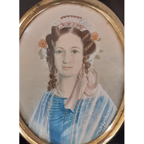 1857 - English School, 19th Century - miniature portrait of a lady wearing a bonnet, quarter-length, waterc... 