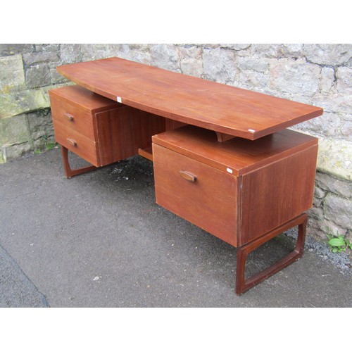 1171 - A vintage G-plan quadrille teak twin pedestal dressing table/desk. Circa 1965, 153cm long and 46 cm ... 