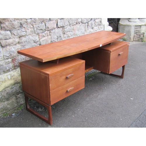 1171 - A vintage G-plan quadrille teak twin pedestal dressing table/desk. Circa 1965, 153cm long and 46 cm ... 