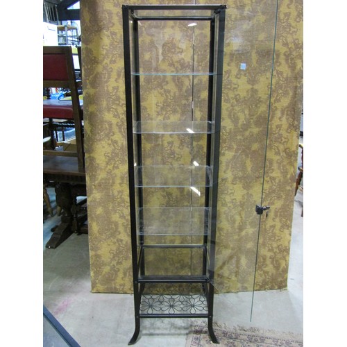 1176 - A contemporary light steel framed free standing shop display cabinet of square cut form raised on sp... 