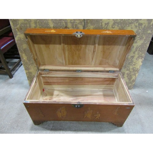 1170 - A Chinese Camphor wood chest with hinged lid and applied character and further detail, 48cm high x 9... 