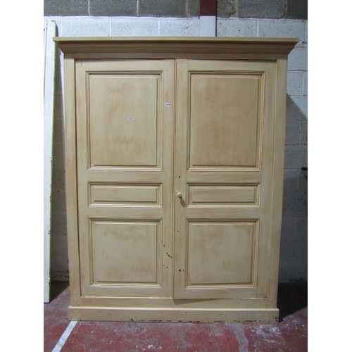 1572 - A 19th century pine wardrobe enclosed by a pair of panelled doors, with later painted finish, 170cm ... 