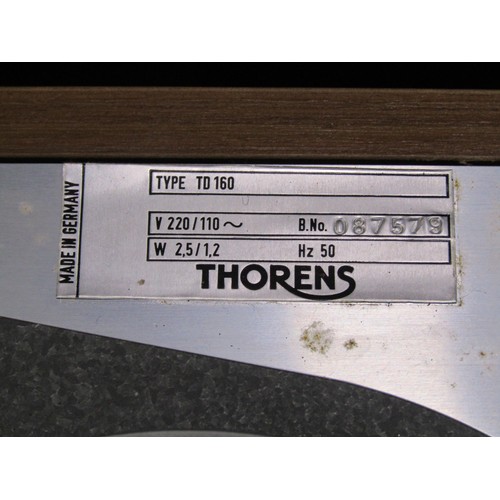 1101 - A Thorens TD160C turntable (appears unused in original package).