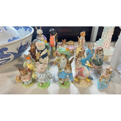 127 - A collection of 21 Beswick Beatrix Potter character figures (21)