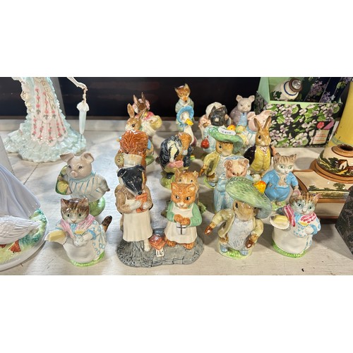 129 - A mixed collection of 21 Beswick Beatrix Potter character figures (21) all with gold back stamps