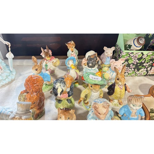 129 - A mixed collection of 21 Beswick Beatrix Potter character figures (21) all with gold back stamps