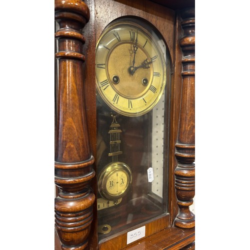 355 - A small walnut cased Vienna regulator wall clock.