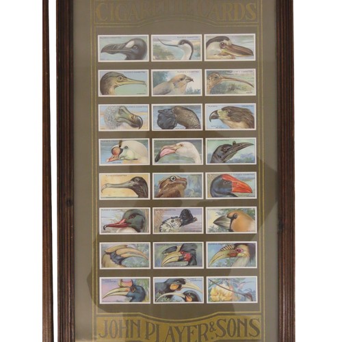 202 - A set of five framed sets of Player's cigarette cards, to include: battle ships, royalty and others,... 