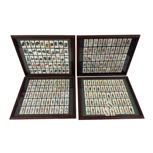 206 - Four framed sets of cigarette cards of Soldiers and military hats, 46 x 55 cm (4)