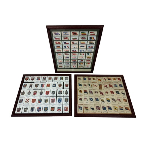 209 - Three framed sets of cigarette cards of Flags: Nations, British Empire, and colleges, 46 x 55 cm (3)