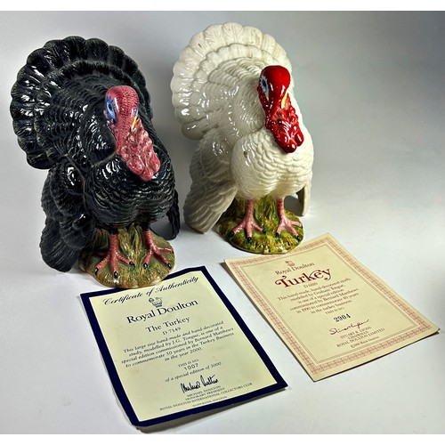 20 - Two Royal Doulton ceramic Turkeys one black D7149 the other white D6889, 15cm tall approx (2) with c... 