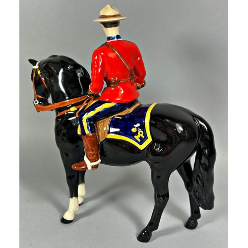 67 - A Beswick model of a Mountie on horseback, 19cm x 19cm approx