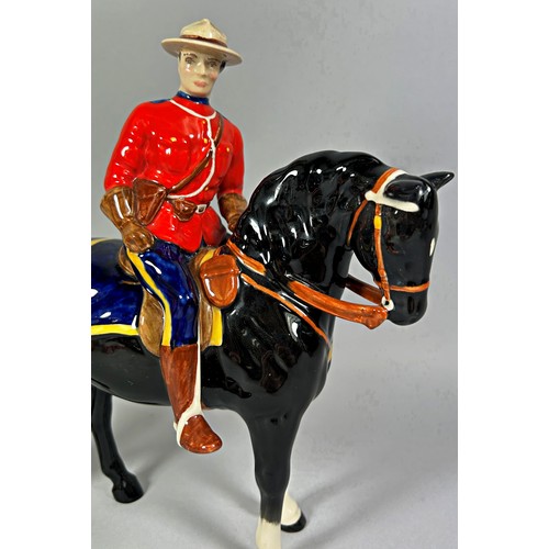 67 - A Beswick model of a Mountie on horseback, 19cm x 19cm approx