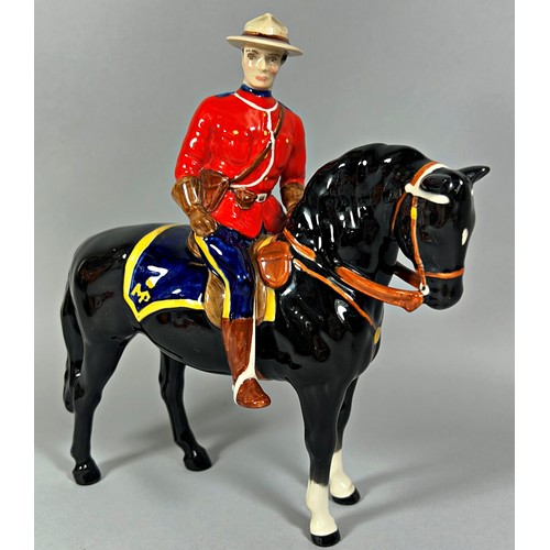 67 - A Beswick model of a Mountie on horseback, 19cm x 19cm approx