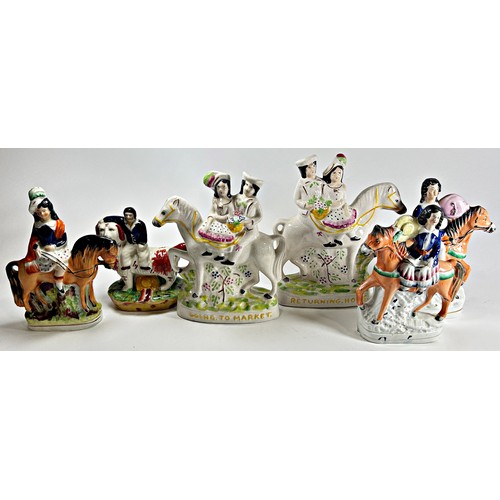 35 - A collection of Staffordshire figures on horseback to include Going to Market and Returning Home, et... 