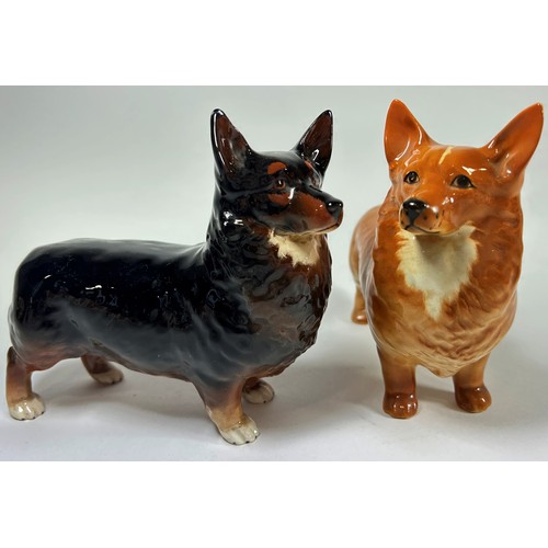 40 - Four Beswick models of dogs to include a white Scotty dog, Dachshund, Corgi, etc, together with a Ro... 