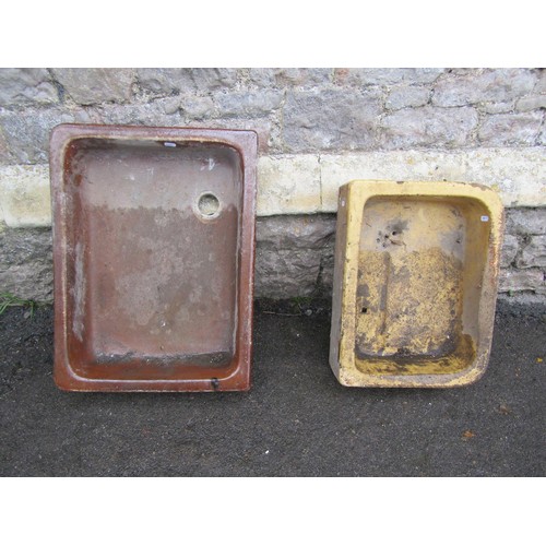 1016 - Two reclaimed glazed stoneware sinks of varying size and design but both with moulded outline, the l... 