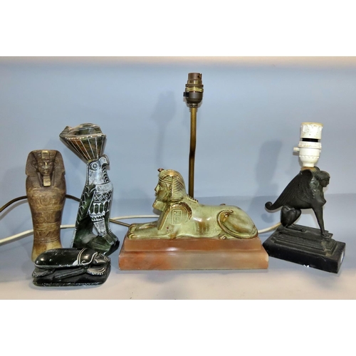 644 - A Sphinx table lamp, together with four other Egyptian souvenirs.