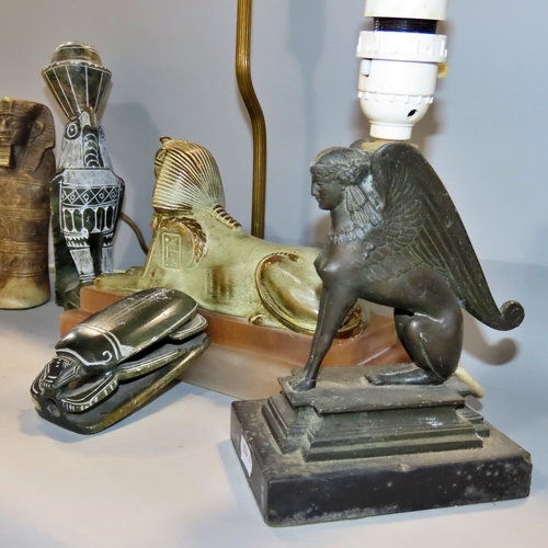 644 - A Sphinx table lamp, together with four other Egyptian souvenirs.