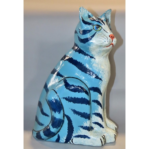 648 - A blue striped papier maché cat 36cm tall