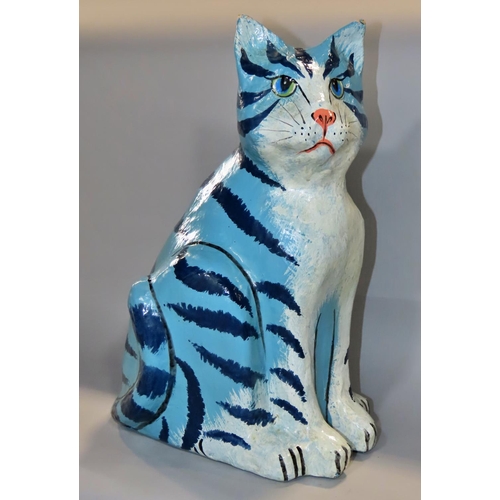 648 - A blue striped papier maché cat 36cm tall