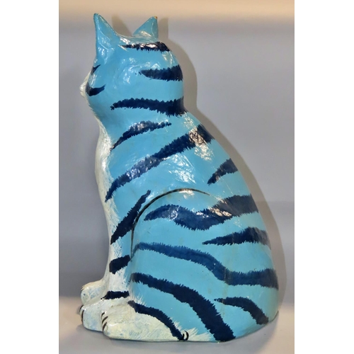 648 - A blue striped papier maché cat 36cm tall